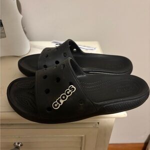Like new, Crocs slip on black sandals, sz 7